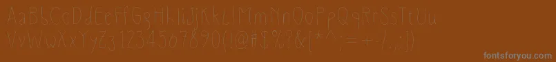 SlimamifLight Font – Gray Fonts on Brown Background