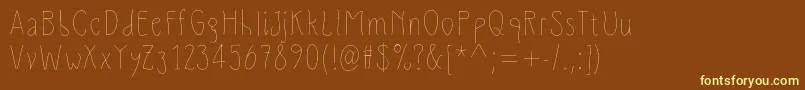 SlimamifLight-fontti – keltaiset fontit ruskealla taustalla