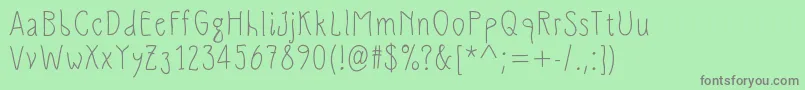 SlimamifMedium Font – Gray Fonts on Green Background