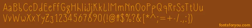 SlimamifMedium Font – Orange Fonts on Brown Background