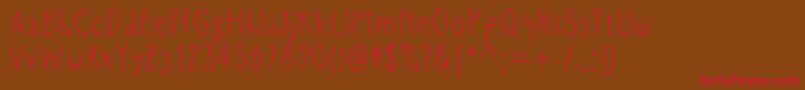 フォントSlimamifMedium – 赤い文字が茶色の背景にあります。