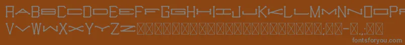 Fonte Slugger Monogram – fontes cinzas em um fundo marrom