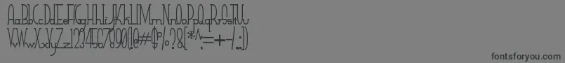 SmallTall Font – Black Fonts on Gray Background