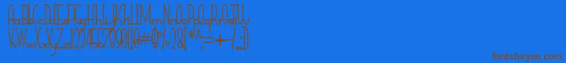SmallTall Font – Brown Fonts on Blue Background