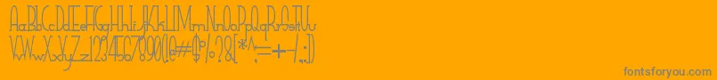 Saiba mais sobre a fonte SmallTall Fonte SmallTall – fontes cinzas em um fundo laranja