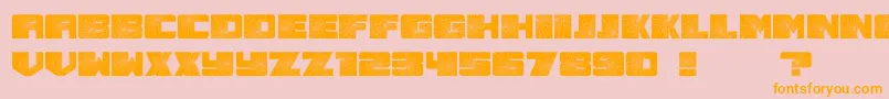 フォントSmashed – オレンジの文字がピンクの背景にあります。