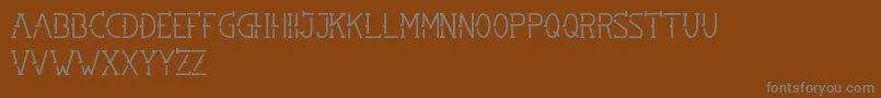 SMBRN Font – Gray Fonts on Brown Background