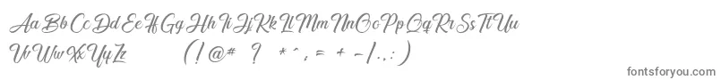 フォントSmile of the Ocean – 白い背景に灰色の文字