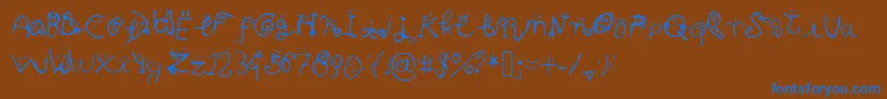 Smiley Font-Schriftart – Blaue Schriften auf braunem Hintergrund