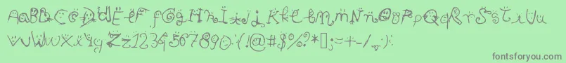 フォントSmiley Font – 緑の背景に灰色の文字