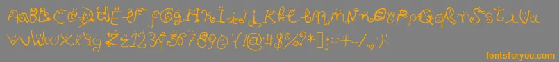 Smiley Font-Schriftart – Orangefarbene Schriften auf grauem Hintergrund