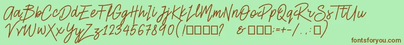 Smiley Font – Brown Fonts on Green Background