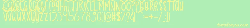 Snow Deer Font – Yellow Fonts on Green Background