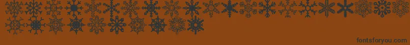 Snowflakes St Font – Black Fonts on Brown Background