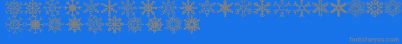 Fonte Snowflakes St – fontes cinzas em um fundo azul