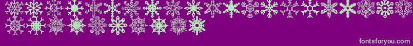 Snowflakes St-fontti – vihreät fontit violetilla taustalla