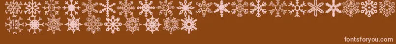 Snowflakes St-fontti – vaaleanpunaiset fontit ruskealla taustalla