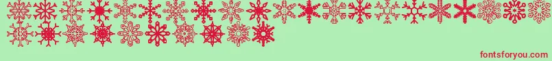 Czcionka Snowflakes St – czerwone czcionki na zielonym tle