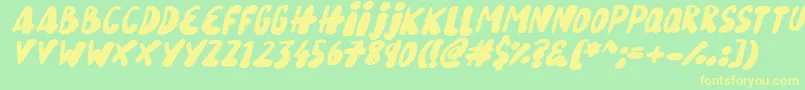 Fonte Snowy Skies Italic – fontes amarelas em um fundo verde