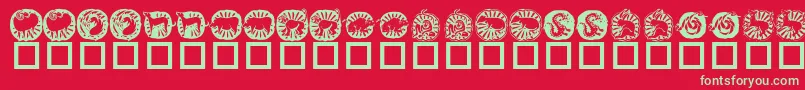 Czcionka KrChineseZodiac – zielone czcionki na czerwonym tle