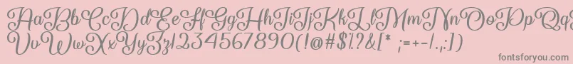 So Damn Beautiful  -fontti – harmaat kirjasimet vaaleanpunaisella taustalla