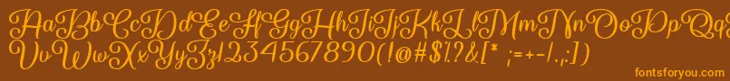 フォントSo Damn Beautiful   – オレンジ色の文字が茶色の背景にあります。