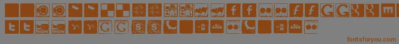 フォントSocial Manual – 茶色の文字が灰色の背景にあります。