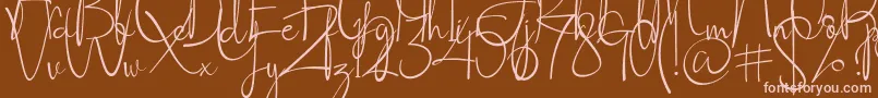 Socialitta-Schriftart – Rosa Schriften auf braunem Hintergrund