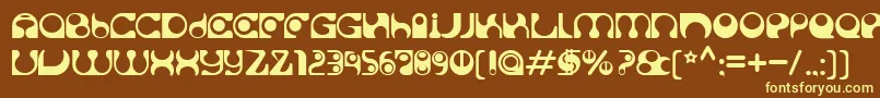 Solange-fontti – keltaiset fontit ruskealla taustalla