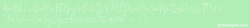 フォントSolidar Monoline Light – 緑の背景に白い文字