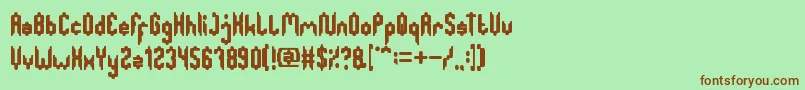 GreatestMap Font – Brown Fonts on Green Background