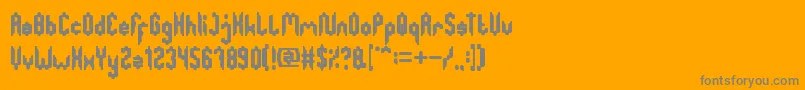 Fonte GreatestMap – fontes cinzas em um fundo laranja