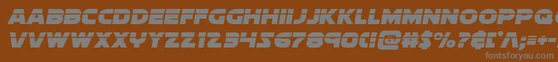 フォントsoloistlaser1 – 茶色の背景に灰色の文字