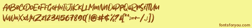 フォントSombori demo – 茶色の文字が黄色の背景にあります。