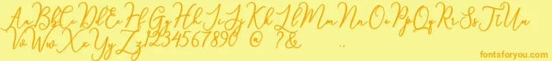 フォントsomething – オレンジの文字が黄色の背景にあります。