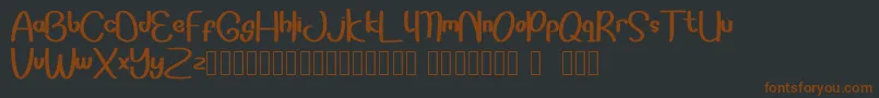 Шрифт Sonddesip – коричневые шрифты на чёрном фоне