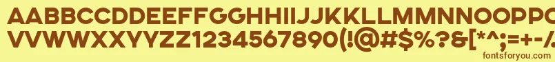 Шрифт SONGER SE Heavy – коричневые шрифты на жёлтом фоне