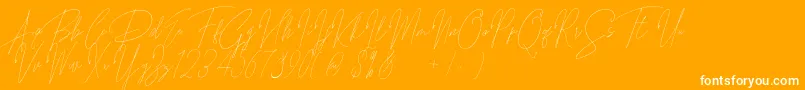 Songstar Free-Schriftart – Weiße Schriften auf orangefarbenem Hintergrund