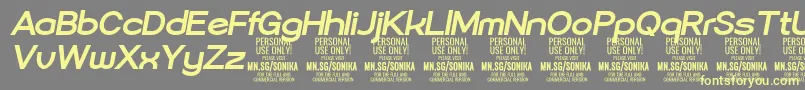 Sonika Bo Ita PERSONAL-Schriftart – Gelbe Schriften auf grauem Hintergrund