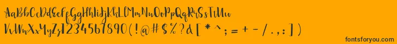 sonya demo-Schriftart – Schwarze Schriften auf orangefarbenem Hintergrund