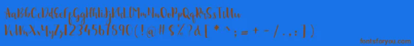 sonya demo-Schriftart – Braune Schriften auf blauem Hintergrund