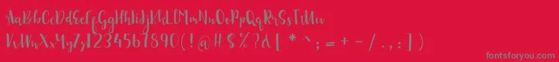 sonya demo-fontti – harmaat kirjasimet punaisella taustalla