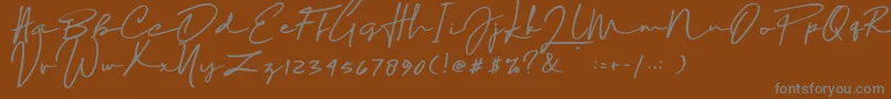 フォントSophia Bella DEMO – 茶色の背景に灰色の文字