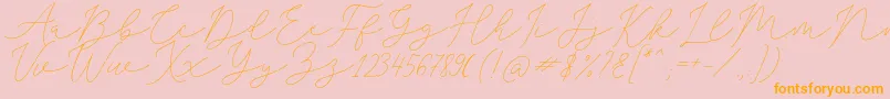 SophiaChristie-fontti – oranssit fontit vaaleanpunaisella taustalla