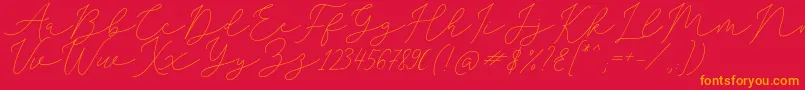 SophiaChristie-Schriftart – Orangefarbene Schriften auf rotem Hintergrund