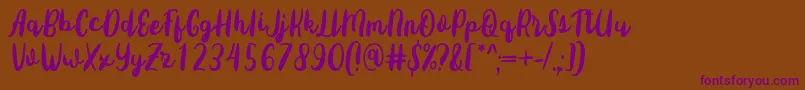 Sottee Font by Rifky 7NTypes Font – Purple Fonts on Brown Background