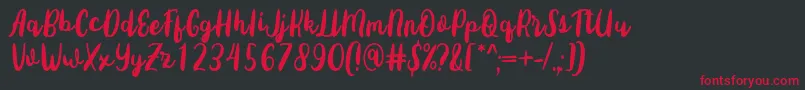 Sottee Font by Rifky 7NTypes Font – Red Fonts on Black Background
