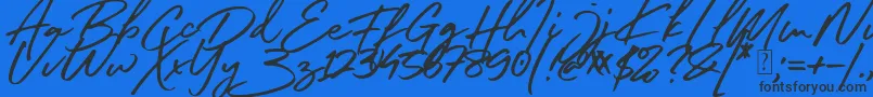 South Celebes Font Font – Black Fonts on Blue Background
