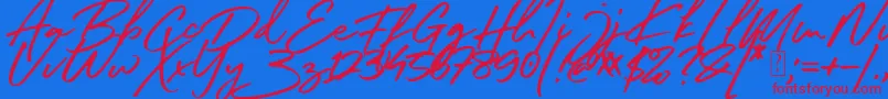 South Celebes Font-Schriftart – Rote Schriften auf blauem Hintergrund