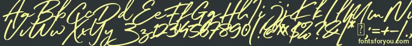 South Celebes Font Font – Yellow Fonts on Black Background